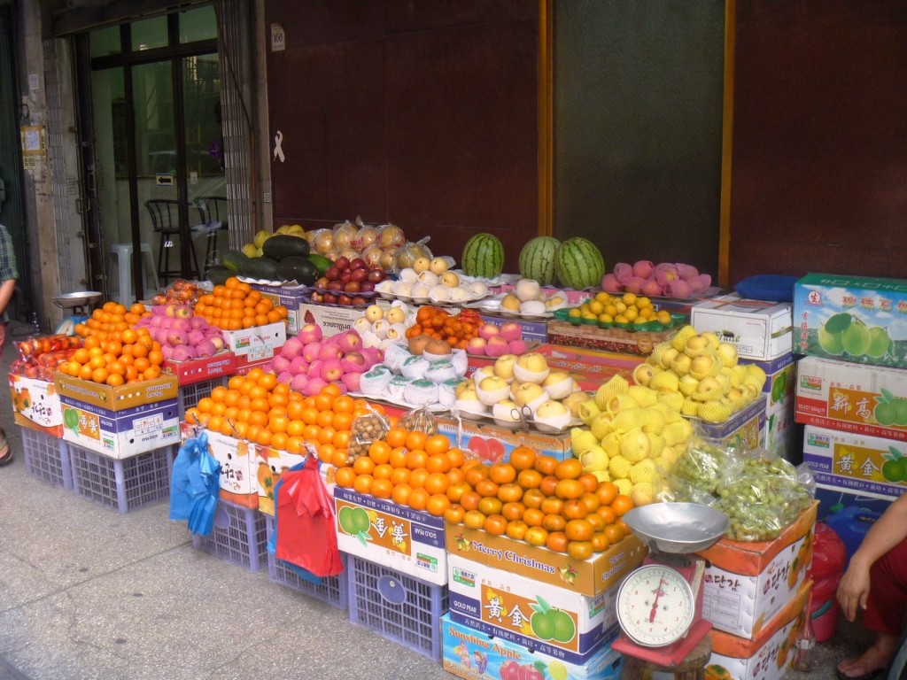 A sidewalk fruit stall