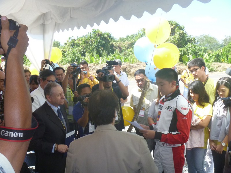 Karting champion (in racing suit) Gabriel Tayao Cabrera