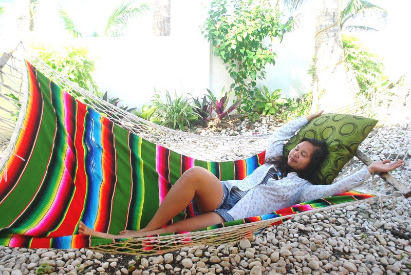 Regine tries out the cozy and colorful hammock