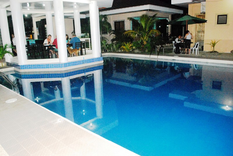 The resort's swimming pool and poolside gazebo bar